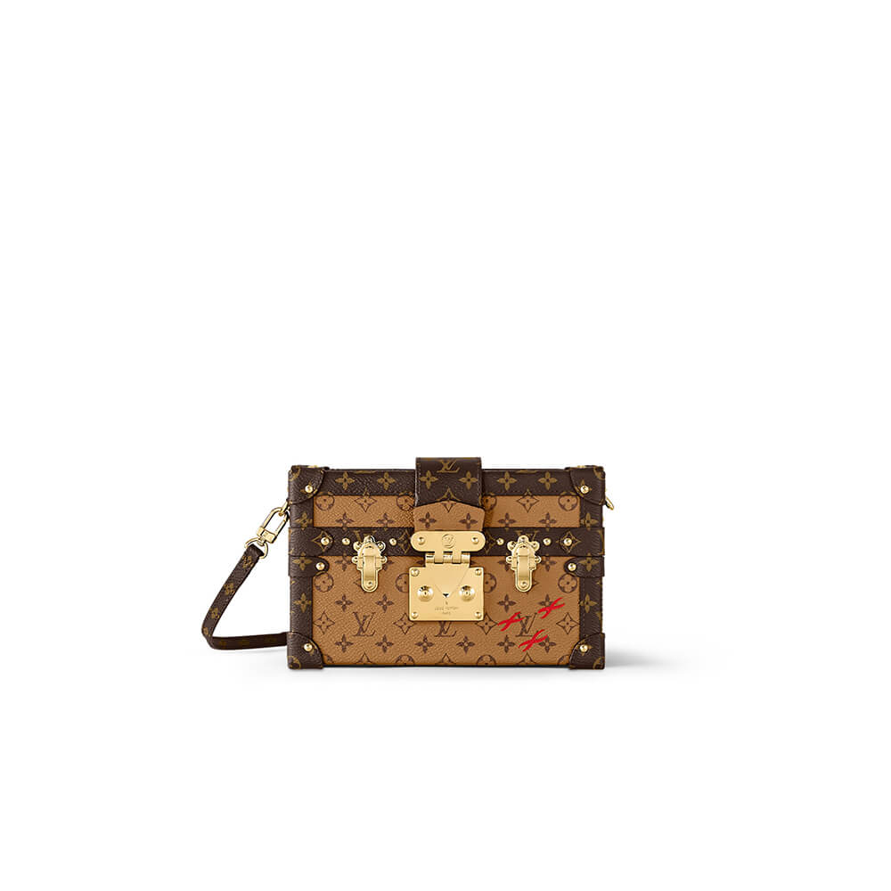 e7ebebdfcbcf111d268e602f7566c2e4 PETITE MALLE - Image 1